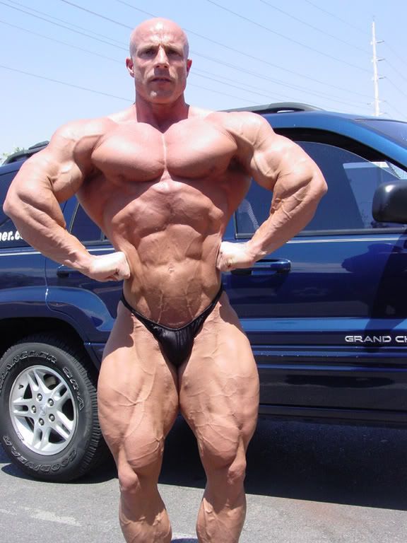 muscledlust:  Garrett Allin has always been a favorite of mine.  Hot, pale, bald,
