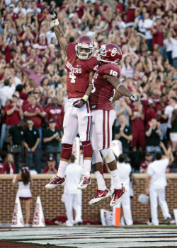 soonersblog:   Wide receiver Kenny Stills #4 and wide receiver Justin Brown #19 of the Oklahoma Sooners celebrate a touchdown against the Kansas Jayhawks on October 20, 2012 at Gaylord Family-Oklahoma Memorial Stadium in Norman, Oklahoma.  