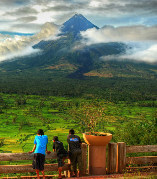 Enjoying the view, Mayon Volcano, Philippines (by marbleplaty).