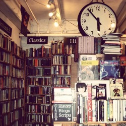 backpackersguidetoearth:  A cute little bookstore I came across in Camden Market in downtown London. All the other shops around the bookstore were closing up and packing everything away for the day. I asked the shopkeeper if he wanted me to leave, but