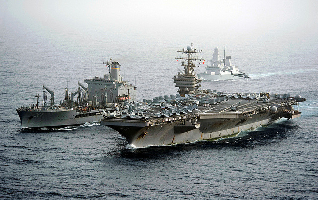 militaryandweapons:  USS Abraham Lincoln and USNS Guadalupe conduct a replenishment-at-sea.