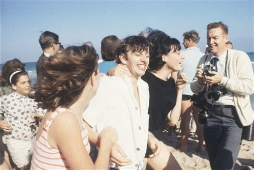 this-is-not-jewish:our-lovely-beatles:Ringo being happily flanked by a couple of female fans [as wel