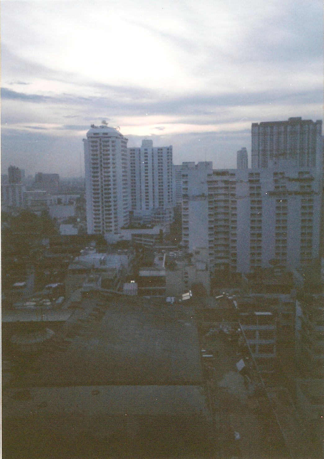 flaneurinpajamas:  Disposable camera shot out a hotel window, 2003.