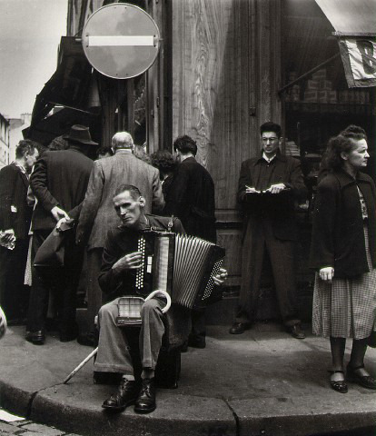 adanvc:  L’accordeoniste, rue Mouffetard. Paris, 1951. by Robert Doisneau