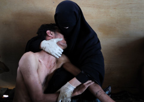 roitfeld:‘This haunting image by Samuel Aranda was named press World Press Photo of the Year for 2012. It shows Fatima al-Qaws cradling her son Zayed (18), who is suffering from the effects of tear gas after participating in an anti-government demonstration, in Sanaa, Yemen’ 
