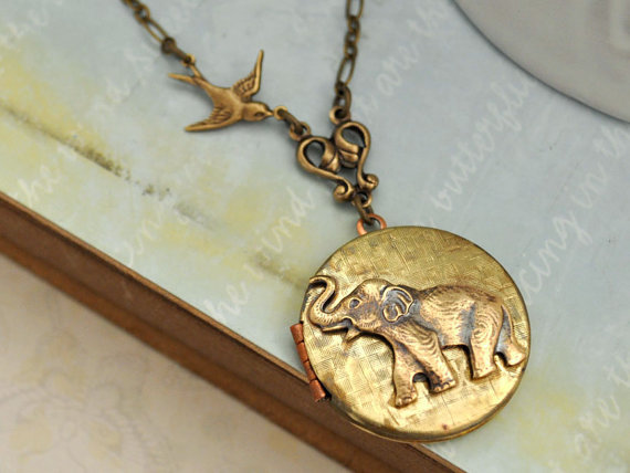 blonde-tornado:  BEST OF FRIENDS baby elephant vintage locket necklace