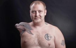 the-starlight-hotel:  A man who lost an arm in a freak accident has had his stump transformed by a tattoo artist into the head of a dolphin. Heine Braeck, 33, hated his stump, caused by a childhood accident on a train track.  The Norwegian realised the