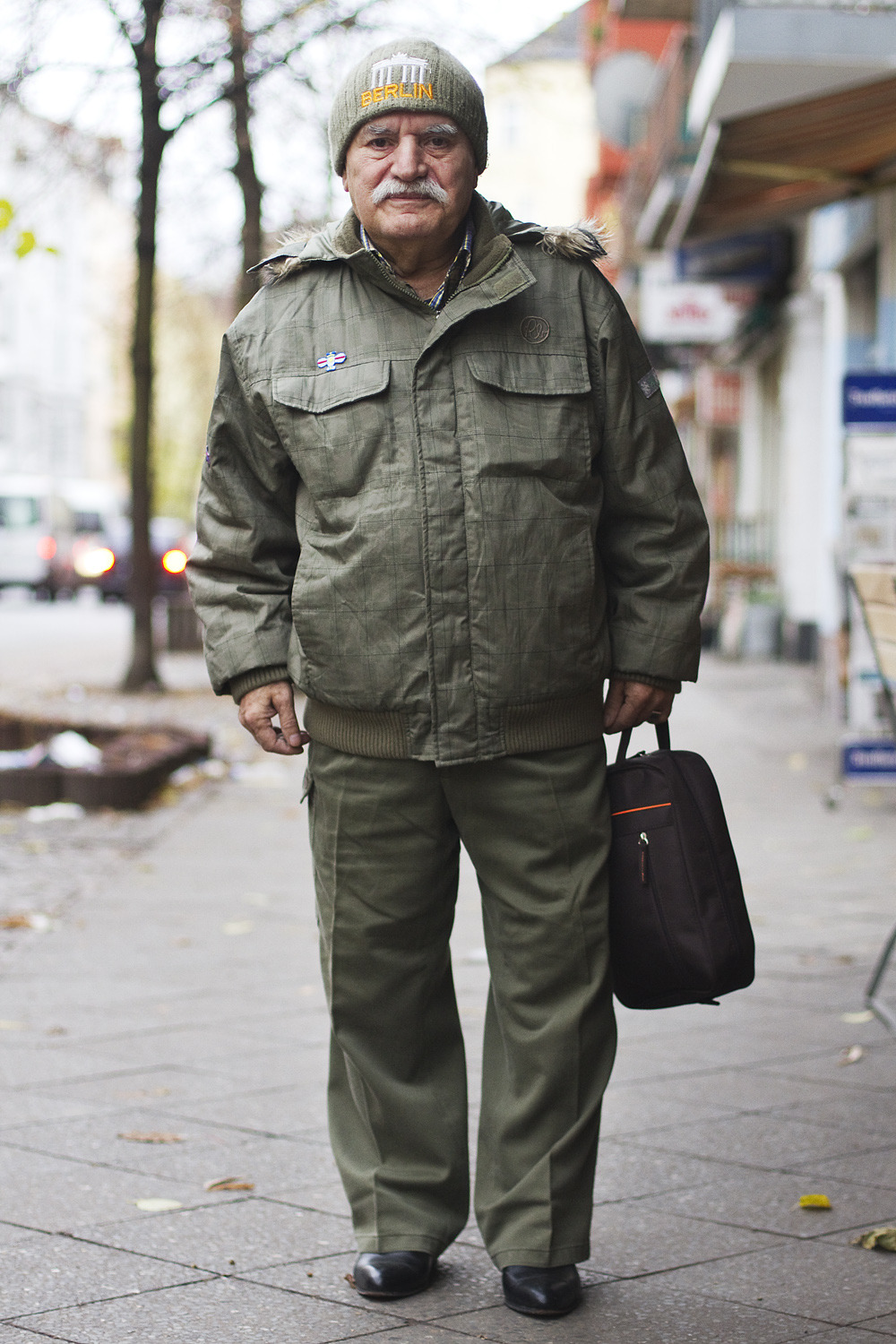 Green puffer jacket with faux fur trim. (And this bag is becoming a favourite I think)