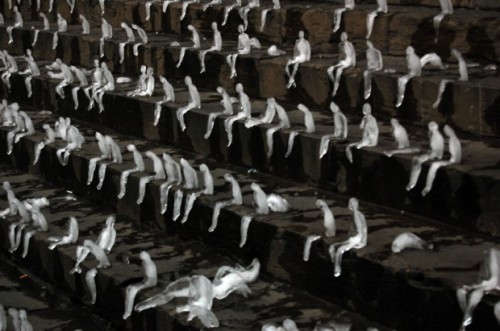  Huge numbers of seated figures were made out of ice by Brazilian artist Néle Azevedo. Installations involving the ice figures last until the final miniature has melted. 