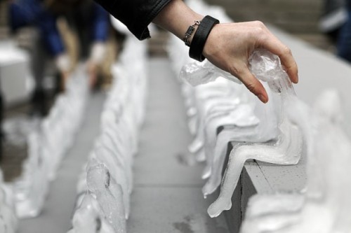 zitterberg:  Huge numbers of seated figures were made out of ice by Brazilian artist Néle Azevedo. Installations involving the ice figures last until the final miniature has melted.