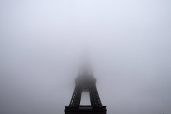  The Eiffel Tower partly hidden in the fog