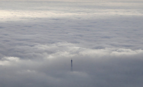 evoleur:chanelblood:blood-h0und:mercurv:repullsive:zielt:The top of the Eiffel Tower through the clo