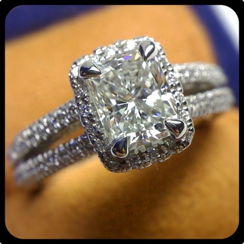 This Venetian 5007CU with a custom diamond halo makes a serious statement. 1.5 carat Radiant cut dia