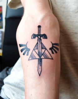 fuckyeahtattoos:     This is my second tattoo, for my love of video games and the Legend of Zelda in particular, and because I owe this passion to my brother.Done by Entouane at La Boucherie Moderne, Brussels, Belgium.    