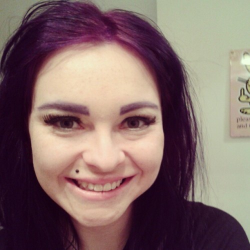 lauradynamite:  Victory rolls fell out, left the makeup, LOVING the purple brows! <3 