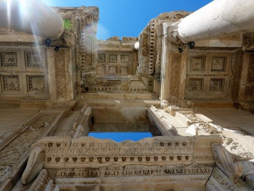 archaicwonder:Looking straight up from the steps of the Library of Celsus at EphesusThe Library of C