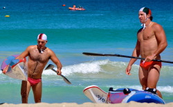 blackandwhite1789:  Hot hairy surf lifesaver and team mate - the contrast between their hairy and smooth bodies is awesome. Which guy’s chest would you prefer to cum on — hairy chest or smooth chest?