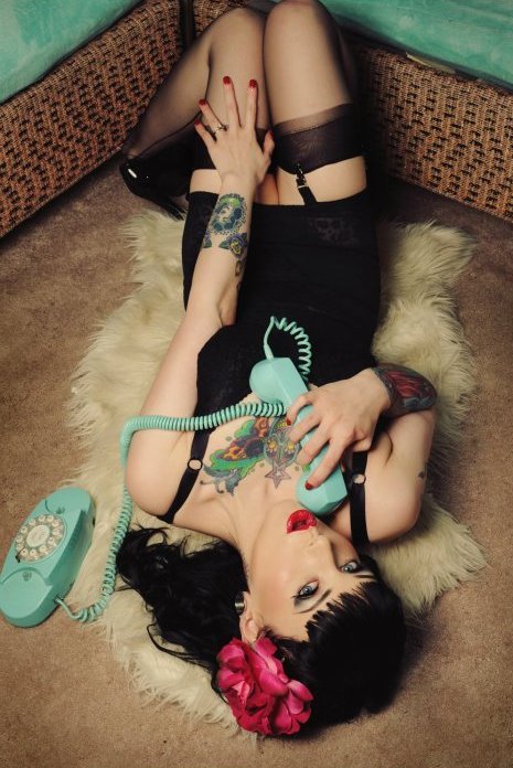 inked64:  She’s a sexy pinup looking woman.  Pure art!!