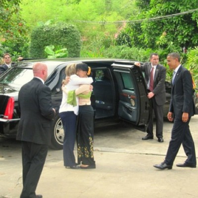 apsies:
“ Aung San Suu Kyi hugs Secretary of State Hillary Rodham Clinton after shaking hands with President Obama in the driveway of her home in Rangoon, Burma on Monday. Obama made history by becoming the first U.S. president to visit the nation....