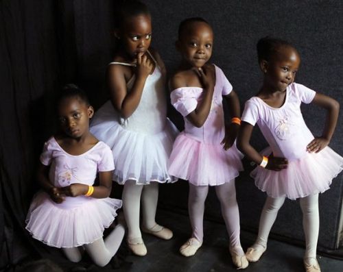 “ Budding ballerinas pose before dancing on stage in Johannesburg. They are part of a South African Mzansi Ballet program that teaches some of the city’s poorest children to dance, free of charge.
”
Photo: Denis Farrell, Associated Press / SF (via...