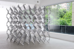 Michael Young. Link wall 2011. die cast aluminum