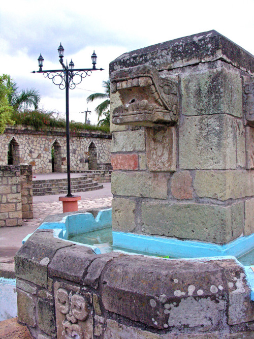 lunacylover:“A fountain in the public square of Copan Ruinas. The head is of Quetzalcoatl, the plume