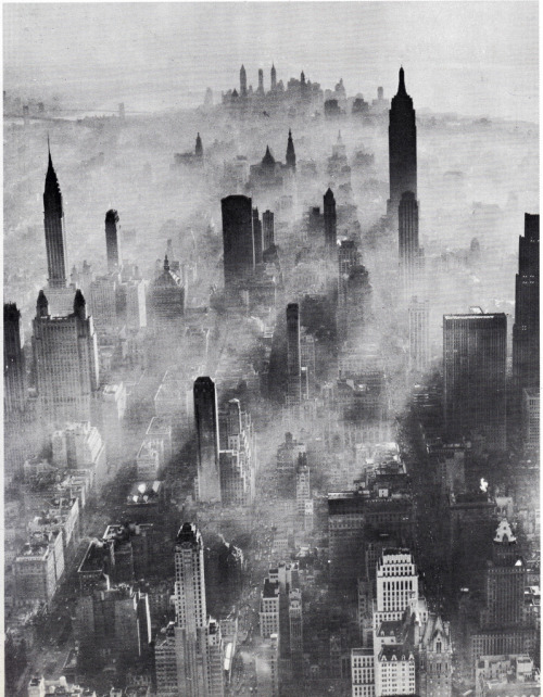 blacksheepboy-:  air view of midtown manhattan looking south in a smoggy day july 1943 (via eralsoto) 