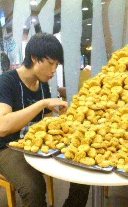 bastardfact:  My boy, back on my dash  I cant describe how much I love this picture and how much I love this boy I know a lot of those chicken nuggets are photoshopped in but it still looks like hes got at least two whole trays of massive chicken nugget