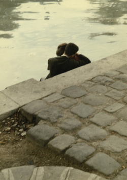  Lovers on the banks of the River Seine near