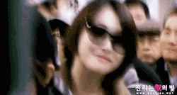 poisonpickles:  Sulli was wearing sunglasses that were a fan gift from sulli94. When she recognized the person taking the video as someone from the site, she smiled at the camera and pointed to the sunglasses. (♥)  