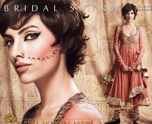 hiscinnamongirl:  Bridal Sutra  The eye make up and the nose ring&hellip;wow. And the dress too.
