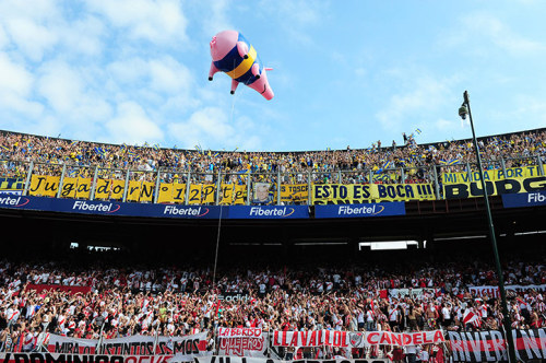 River Plate fans inflate a giant pig to taunt fans of Boca Juniors at the 2012 Superclasico