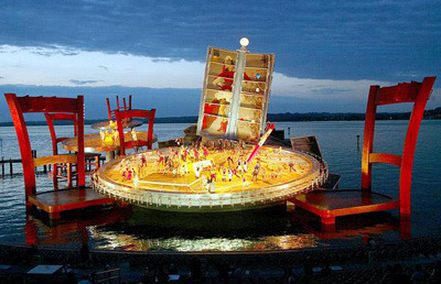 fuckyeahbooks:    Aida on the floating ‘book’ stage on Lake Constance in Bregenz, Austria. This festival has become renowned for its unconventional staging of shows. Verdi’ s opera “A Masked Ball” in 1999 featured a giant book being read by