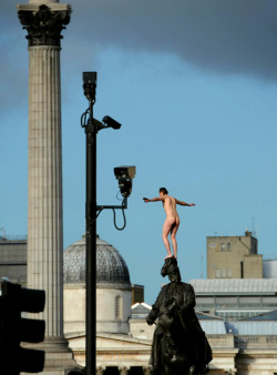 fuckanimals:  Man climbs 30 ft statue of Prince George, the Duke of Cambridge, in London and strips naked.  source 