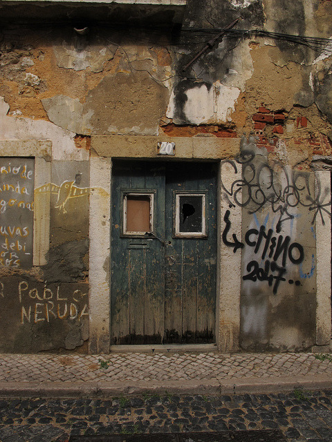 inkandchrome:  Door in Alfama, Lisbon. by Christine Dolan on Flickr.