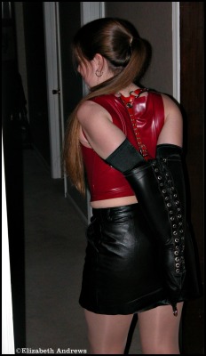 devoted-one: elizabethandrews:  Personal play time - 2003- leather armbinder, latex and leather - later that night I was tied up by Ivan Boulder.   Hot 