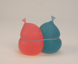 oarv:  Two Balloons 2010 7x7x4” Tinted Resin, Rubberband 