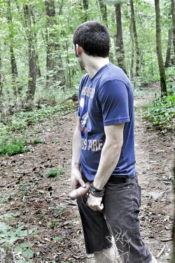 Young man excited to be out in nature! Cute haircut, too.