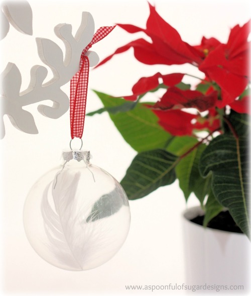 DIY Glass Feather Ornament Tutorial from A Spoonful of Sugar here. Remember the peacock feather ques