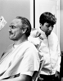 Marlon Brando chuckles as Al Pacino cracks