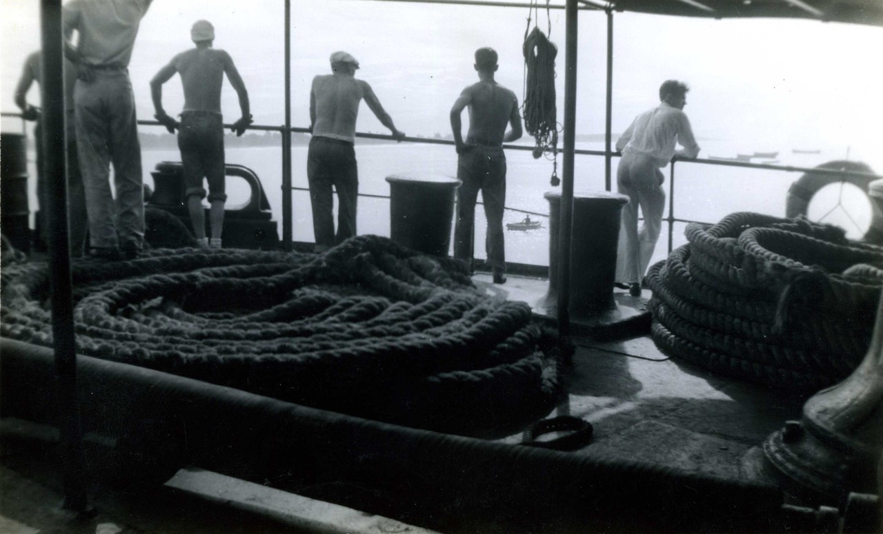 twoseparatecoursesmeet:  Merchant Marines at the Rail.  Jack Weigel, 1941