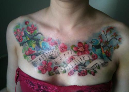 fuckyeahtattoos:  Right after it was done, still have to find a “not shiny” version. 13 1/2 hours of work, done over approximately 4 1/2 sessions. This was my first big tattoo, but the pain was only bad in the dead center of my chest where it is