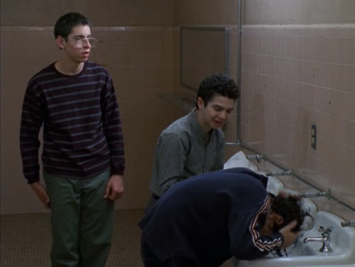 Bill, Neil, and Sam hide in the bathroom instead of showering. The idea is they&rsquo;ll wet the
