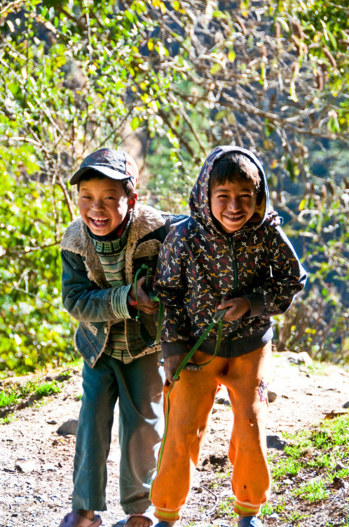 Buddies. Their smiles make me so happy! Taken along the trail to Sing Gompa, Rasuwa, Nepal. Photogra