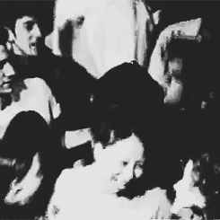 probablythemouth:  Julian Casablancas in the crowd at The White Stripes show - NYC 2002 [x] 