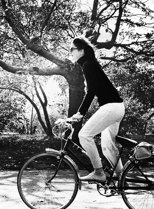 thenewmanhattanite:Jacqueline Kennedy Onassis Rides Her Bicycle in Central Park. photographed by Ron