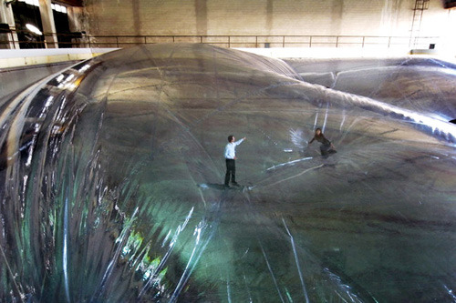 showslow:   On Space Time Foam   A fantastic installation by Argentinian artist Tomàs Saraceno which will be on display at the Hangar Bicocca in Milan until February 3rd. “On Space Time Foam” is made of multiple layers of PVC membranes suspended