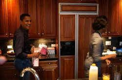 politi-gal: The Obama family before the White House   They got the under-cabinet lights and inlaid appliances, they rich as fuck lol