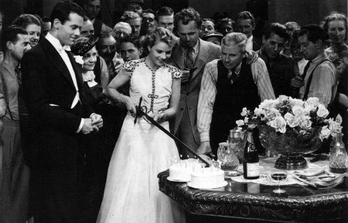 A birthday party for Annabella on the set of Wings of the Morning. In attendance, Henry Fonda, director Harold Schuster and cinematographer Ray Rennahan, 1937.