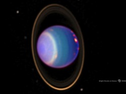 ikenbot:  Bright Clouds on Uranus The false colors in this image indicate altitude. Credit: Erich Karkoschka (University of Arizona) and NASA The green and blue regions show where the atmosphere is clear, allowing sunlight to penetrate deep into Uranus.